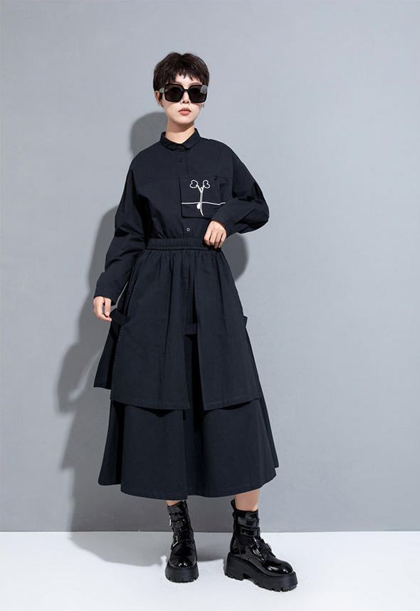 韓国ファッション　Aライン　特徴のあるデザイン　ロングスカート